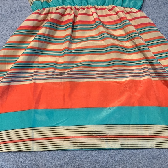 Small sheer mini dress. Needs a slip or something underneath. - Picture 3 of 5